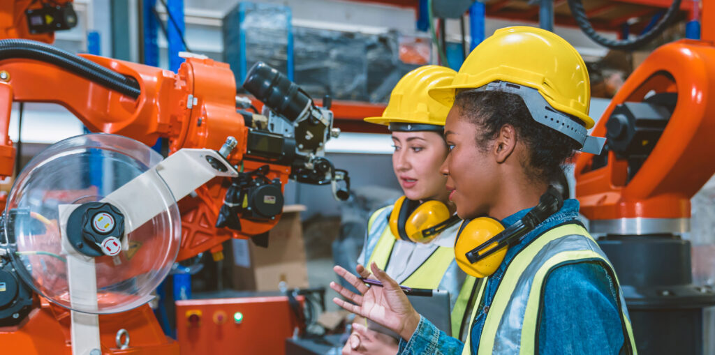 Women engineer worker working team training together at work in