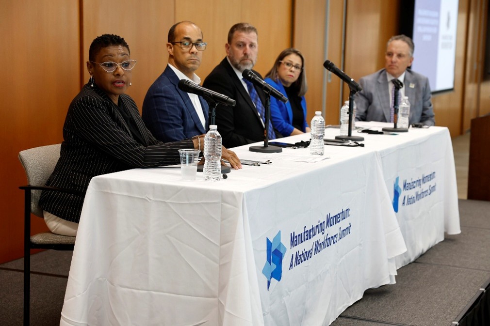 Speakers at a Manufacturing event