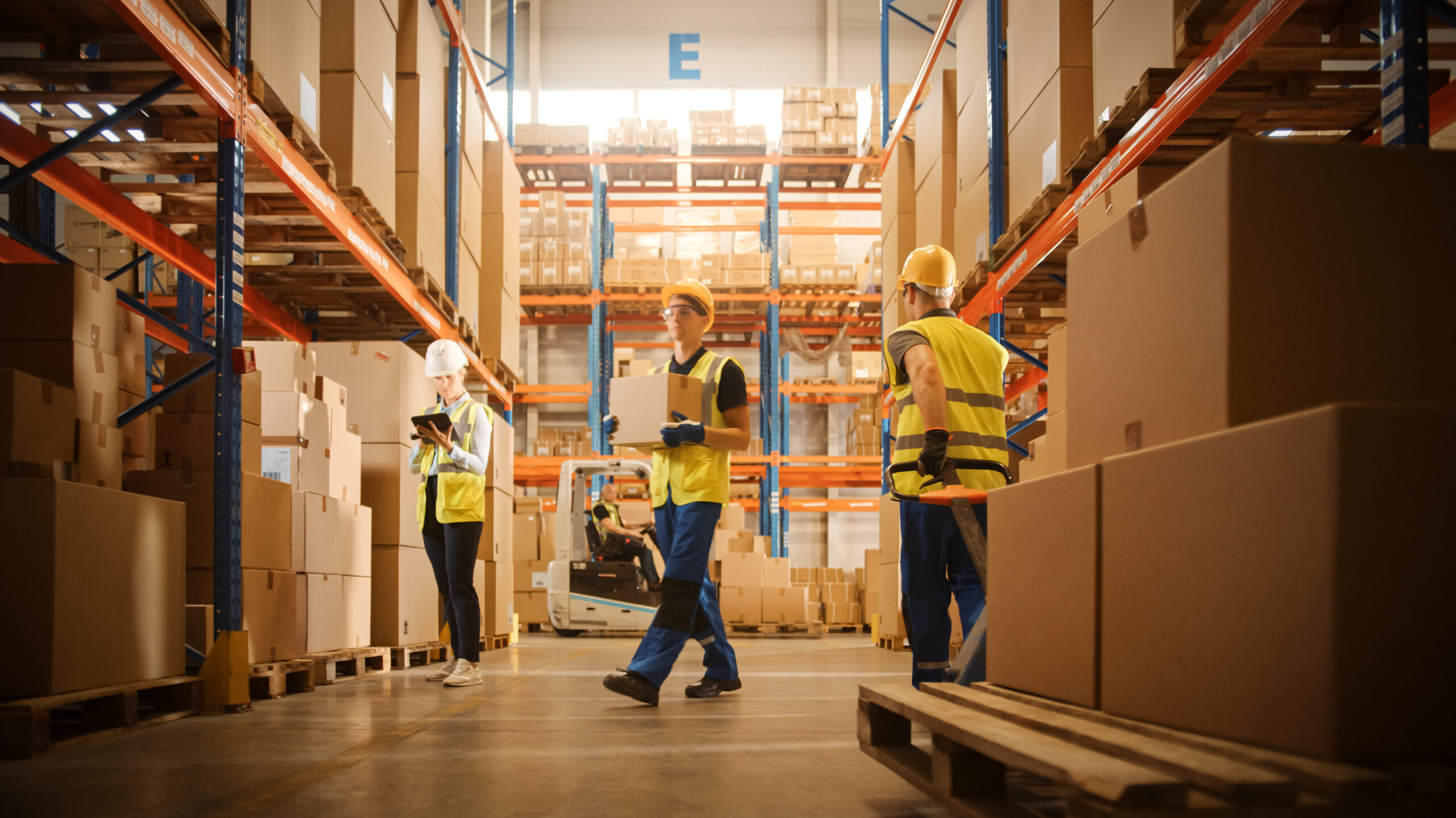 Retail Warehouse full of Shelves with Goods in Cardboard Boxes,