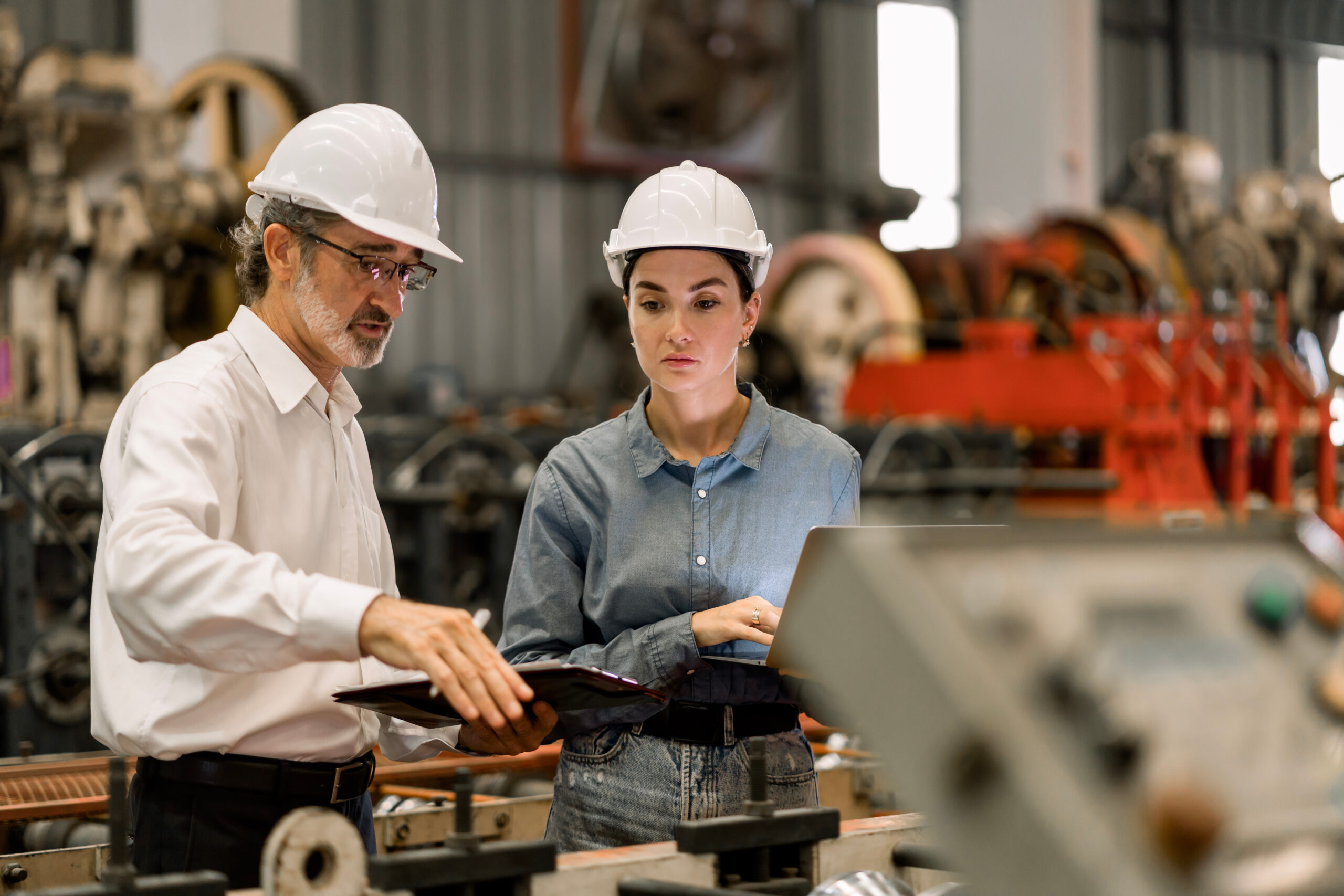 Professional engineer,worker,technician use clipboard discuss wo
